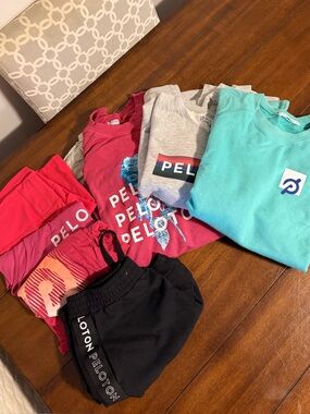 Peloton crew necks, long sleeves, tank tops and shorts.